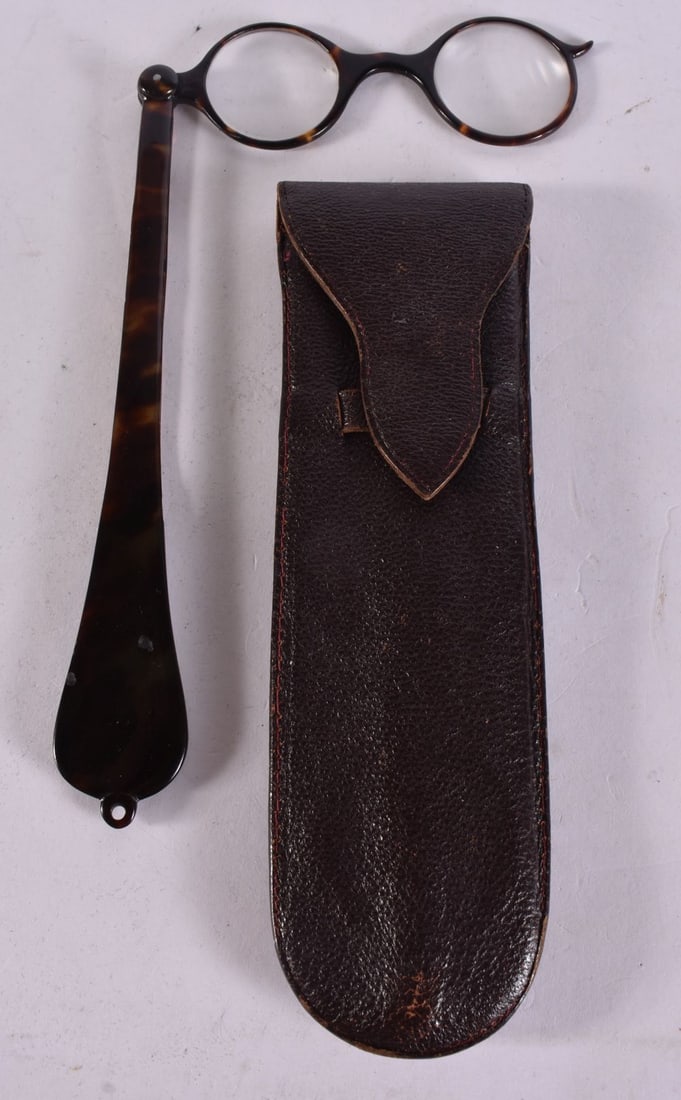 A PAIR OF TORTOISESHELL LORGNETTES. 28 cm long. (1 of 2)