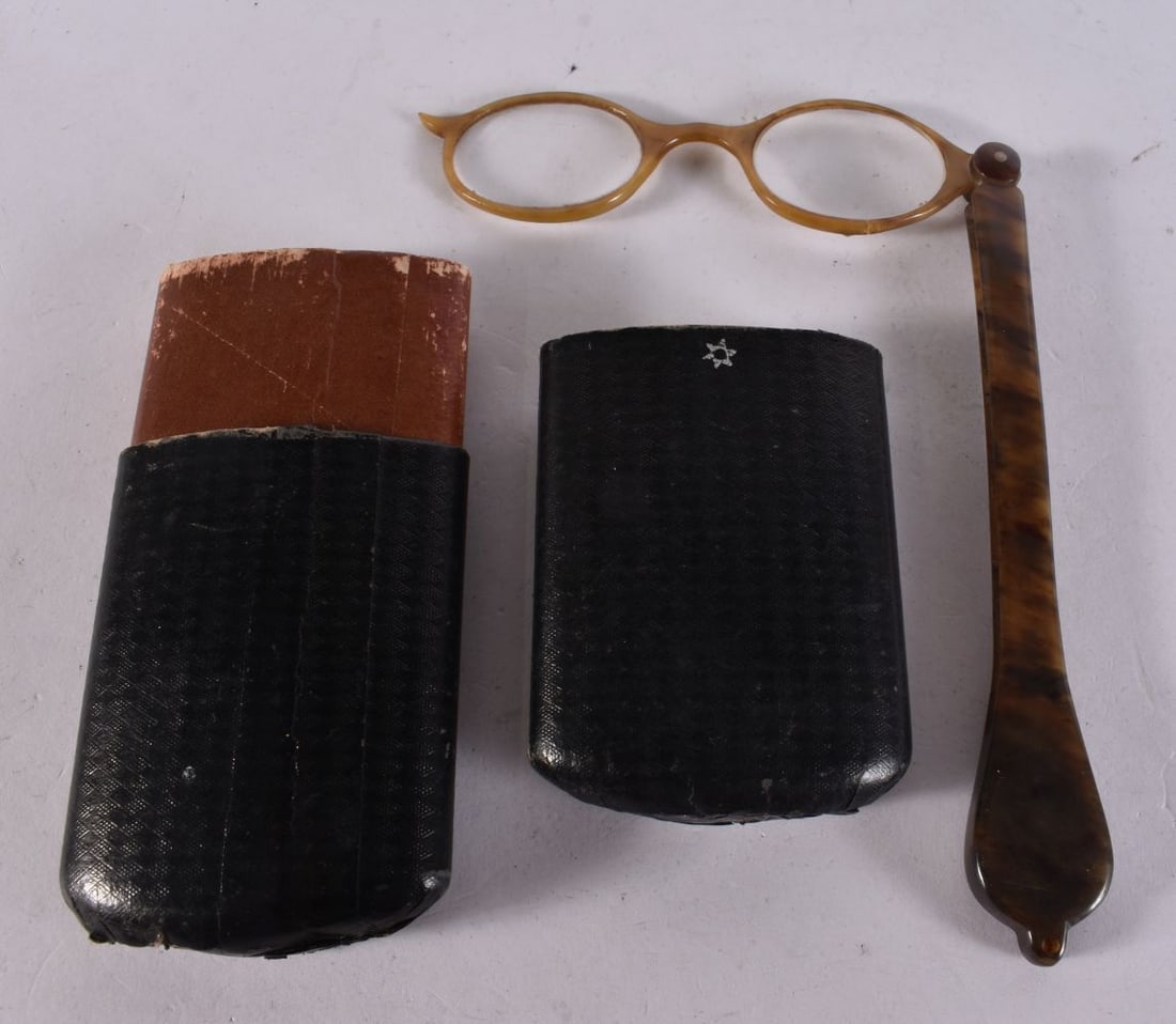 A PAIR OF HORN LORGNETTES. 23 cm long. (1 of 2)