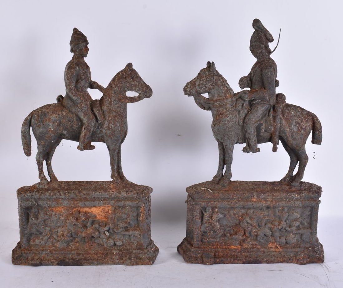 A PAIR OF VICTORIAN CAST IRON DOOR STOPS. 34 cm x 16 cm. (1 of 2)