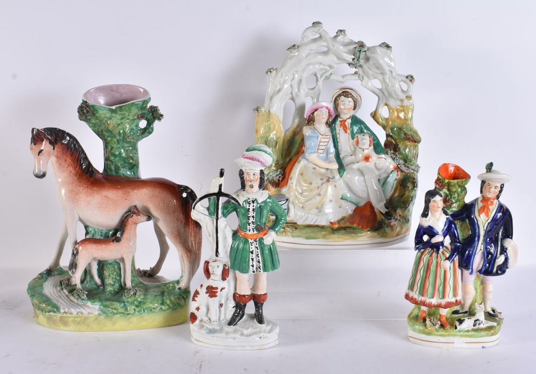 FOUR ANTIQUE STAFFORDSHIRE POTTERY FIGURES. Largest 27 cm high. (4) (1 of 7)