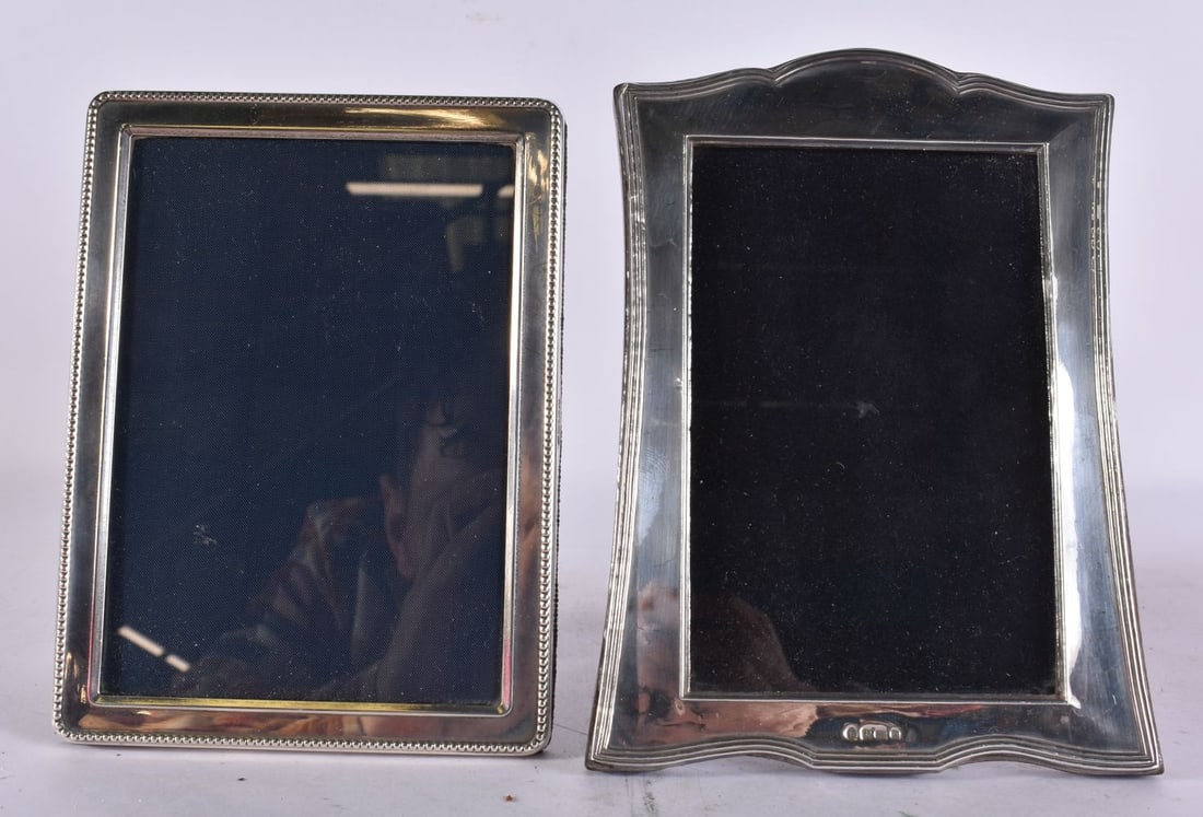 TWO SILVER PHOTOGRAPH FRAMES. 365 grams overall. 15 cm x 10 cm. (2): TWO SILVER PHOTOGRAPH FRAMES. 365 grams overall. 15 cm x 10 cm. (2)