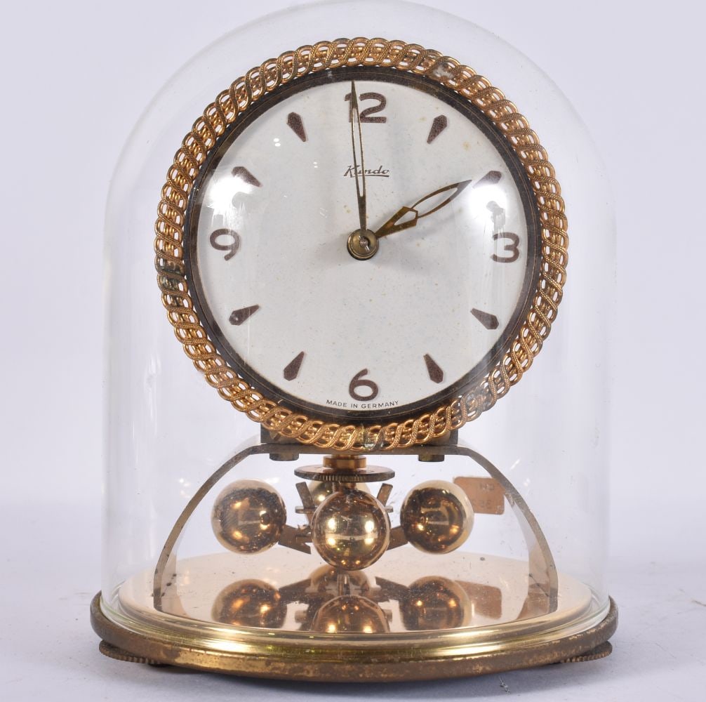 A KUNDO ANNIVERSARY CLOCK. 15 cm x 9 cm.: A KUNDO ANNIVERSARY CLOCK. 15 cm x 9 cm.