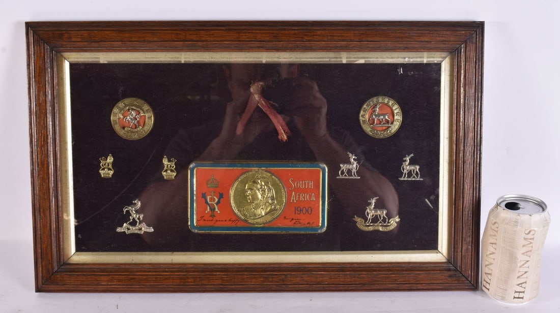 AN ANTIQUE COLLECTION OF MEDALS, INSIGNIAS AND A TIN. 50 cm x 28 cm. (1 of 7)