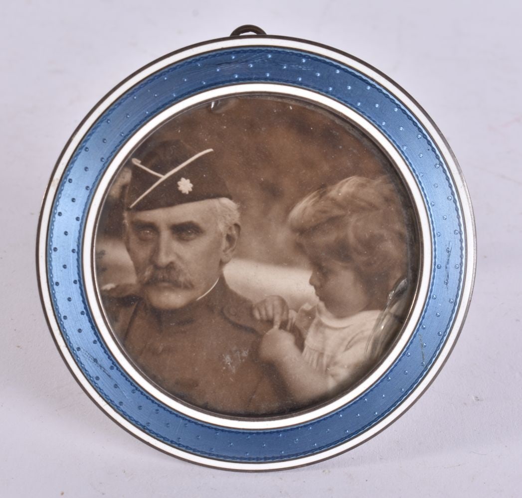 AN ART DECO SILVER AND ENAMEL FRAME. 92 grams overall. 8.25 cm wide.: AN ART DECO SILVER AND ENAMEL FRAME. 92 grams overall. 8.25 cm wide.