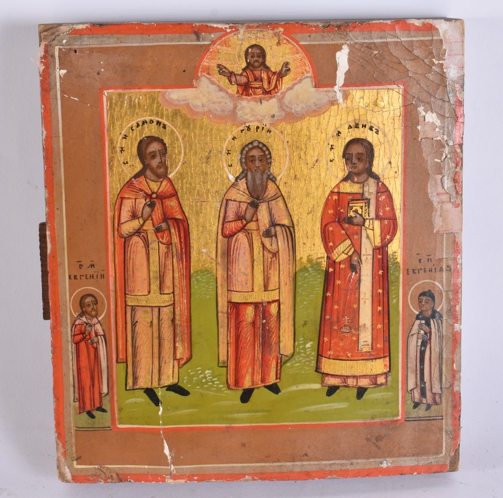 A PAINTED RUSSIAN WOOD ICON. 20.5 cm x 17.5 cm. (1 of 4)