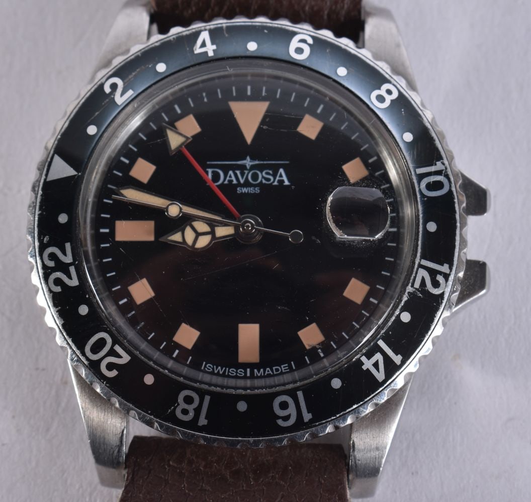 A DAVOSA MILITARY BLACK DIAL WRISTWATCH. Untested. 4 cm wide.: A DAVOSA MILITARY BLACK DIAL WRISTWATCH. Untested. 4 cm wide.