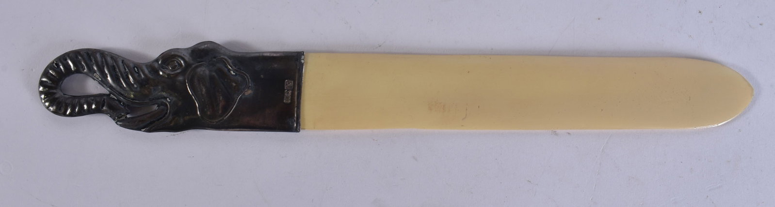 AN ANTIQUE CONTINENTAL SILVER LETTER OPENER with plastic shaft. 32.6 GRAMS. 27 cm long.: AN ANTIQUE CONTINENTAL SILVER LETTER OPENER with plastic shaft. 32.6 GRAMS. 27 cm long.