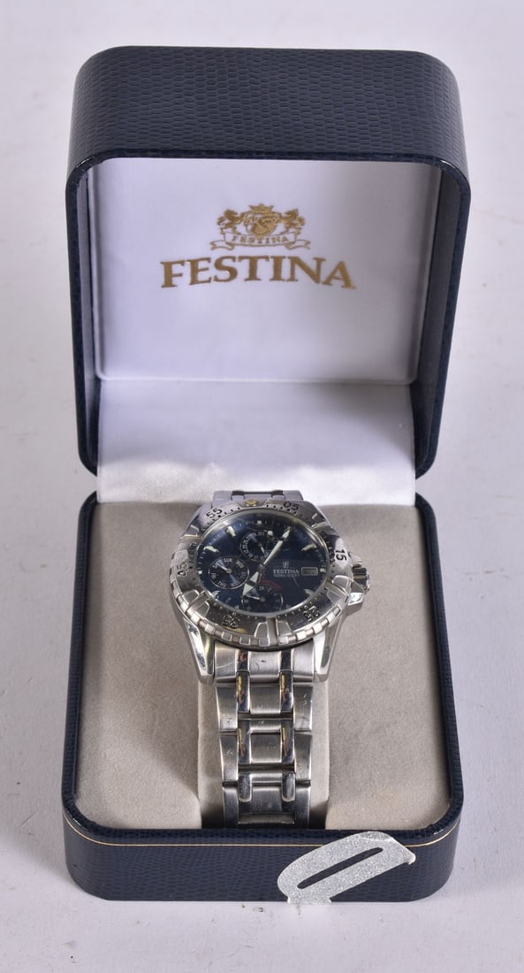 A FESTINA CHRONOGRAPH WRISTWATCH. Not running. 4.5 cm wide.: A FESTINA CHRONOGRAPH WRISTWATCH. Not running. 4.5 cm wide.