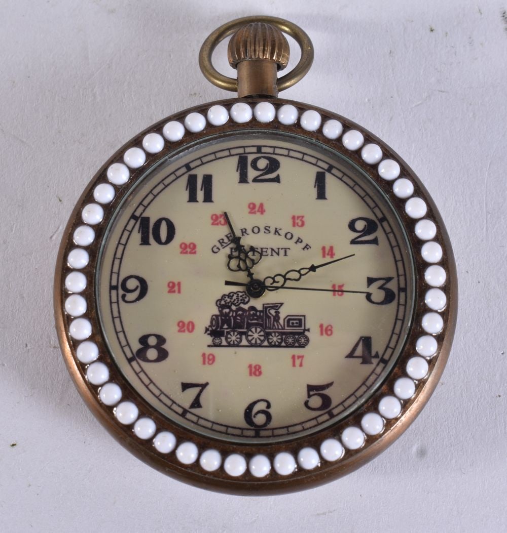 A CONTINENTAL POCKET WATCH. Working. 5.5 cm wide. (1 of 2)