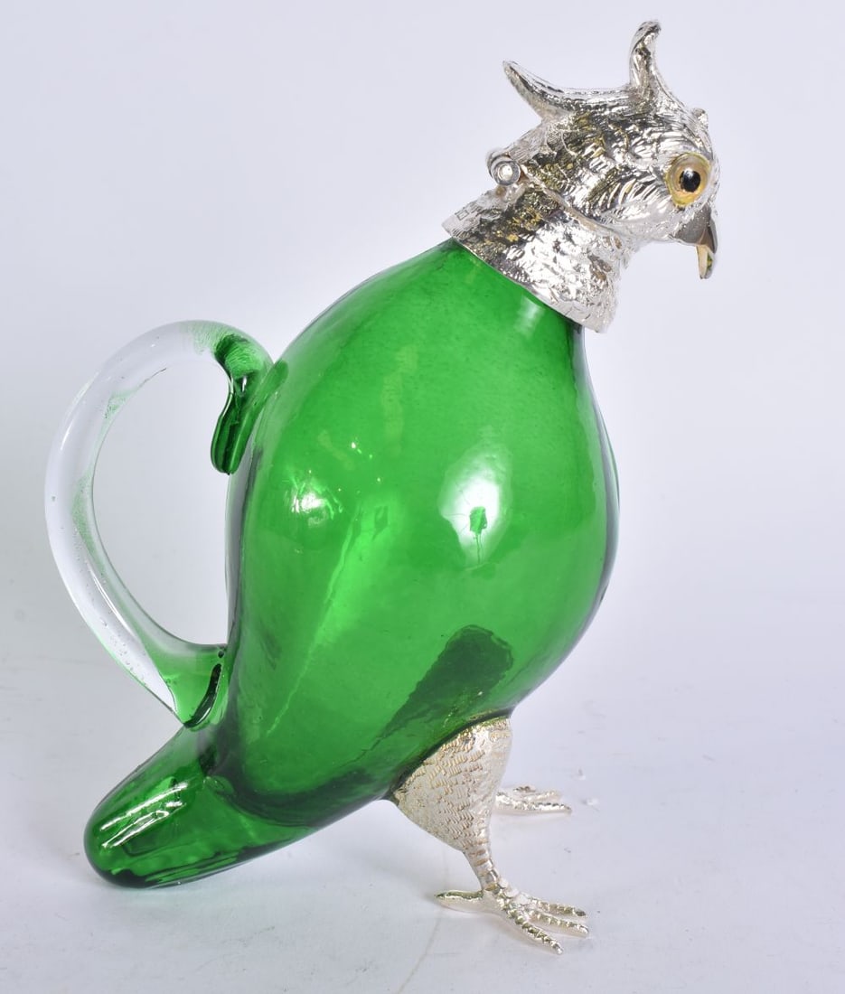 A SILVER PLATED PARAKEET CLARET JUG. 18 cm high. (1 of 6)