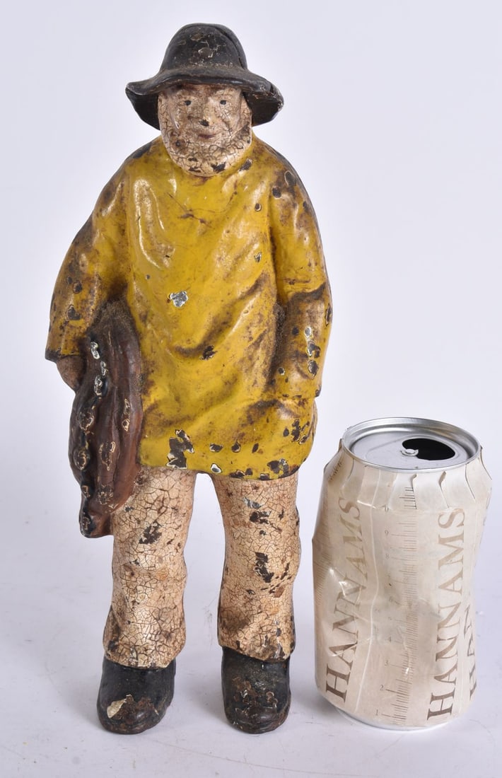 A COLD PAINTED CAST IRON SAILOR. 28 cm high. (1 of 5)