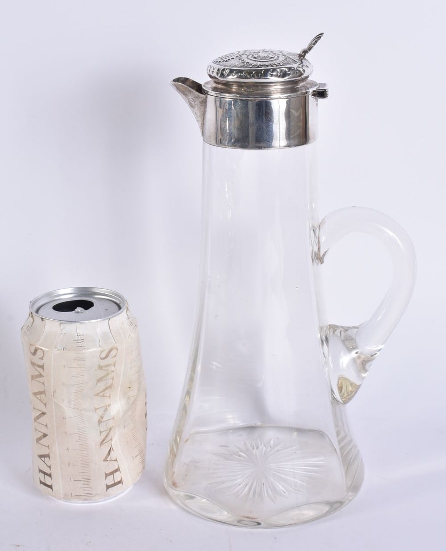 A SILVER MOUNTED CLARET JUG. 27 cm high. (1 of 5)