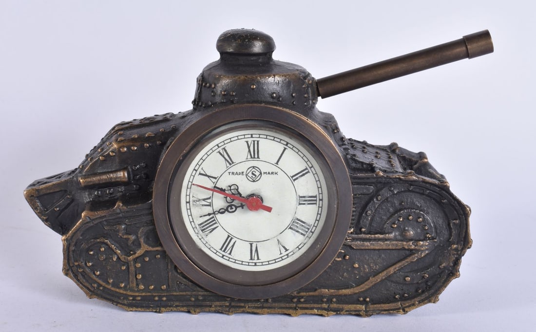 A BRONZE TANK CLOCK. Running. 12.5 cm wide.: A BRONZE TANK CLOCK. Running. 12.5 cm wide.