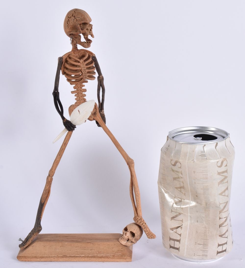 A MEMENTO MORI WOOD SKELETON. 23.5 cm high. (1 of 5)