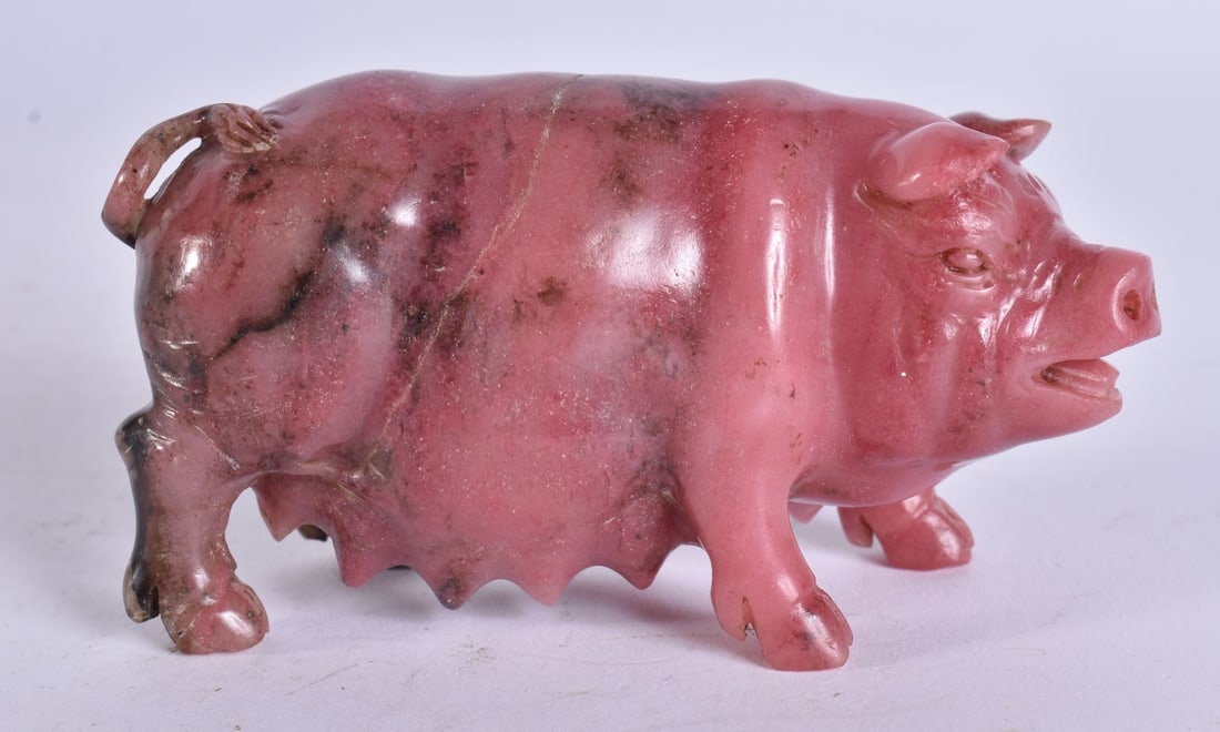 A CARVED RHODONITE FIGURE OF A PIG possibly Russian. 9.5 cm wide.: A CARVED RHODONITE FIGURE OF A PIG possibly Russian. 9.5 cm wide.