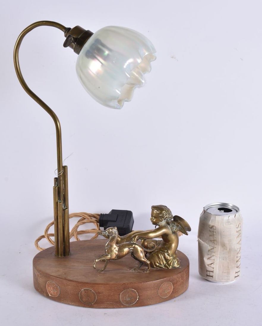 AN ANTIQUE BRONZE GRAND TOUR TABLE LAMP with iridescent glass shade. 40 cm x 20 cm.: AN ANTIQUE BRONZE GRAND TOUR TABLE LAMP with iridescent glass shade. 40 cm x 20 cm.