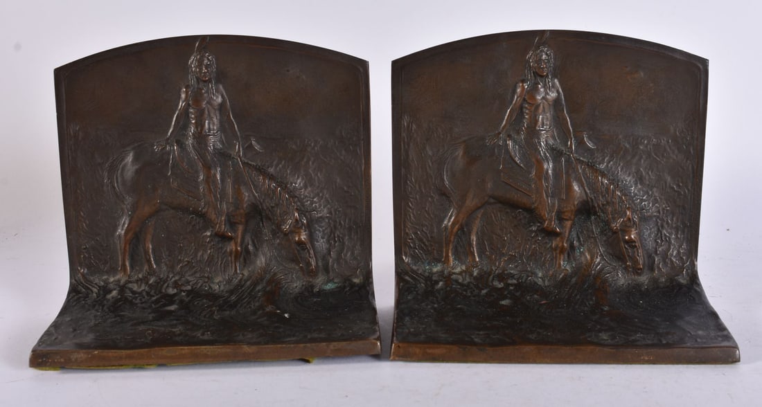 A PAIR OF ANTIQUE BRONZE BOOKENDS formed as Native Americans on horseback. Each end 14 cm x 14 cm. (1 of 5)