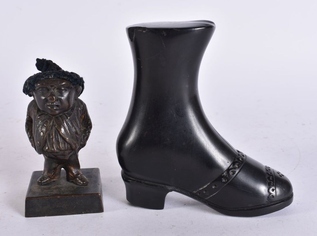 AN ANTIQUE BRONZE FIGURAL PEN WIPE and an ebony shoe. Largest 11 cm high. (2) (1 of 5)