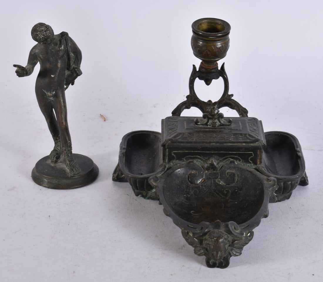 AN ANTIQUE GRAND TOUR BRONZE DESK STAND and a bronze figure of narcissus. Largest 22 cm x 10 cm. (2): AN ANTIQUE GRAND TOUR BRONZE DESK STAND and a bronze figure of narcissus. Largest 22 cm x 10 cm. (2)