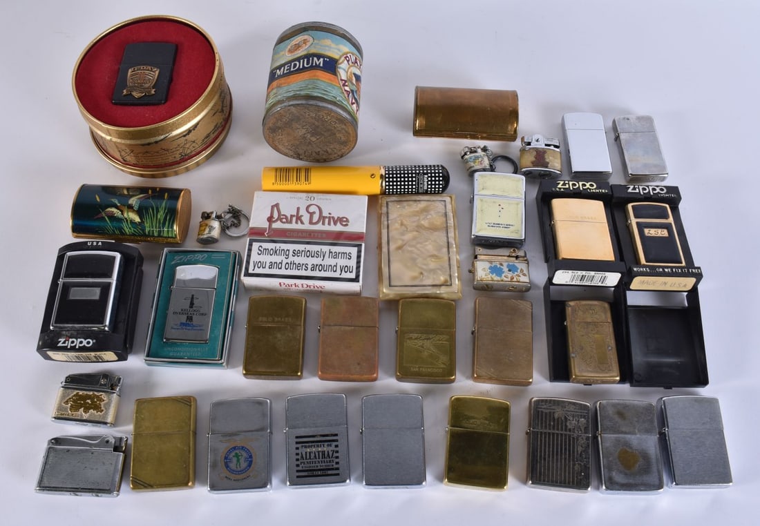 A SEALED PLAYERS TOBACCO TIN together with zippo lighters etc. (qty) (1 of 2)