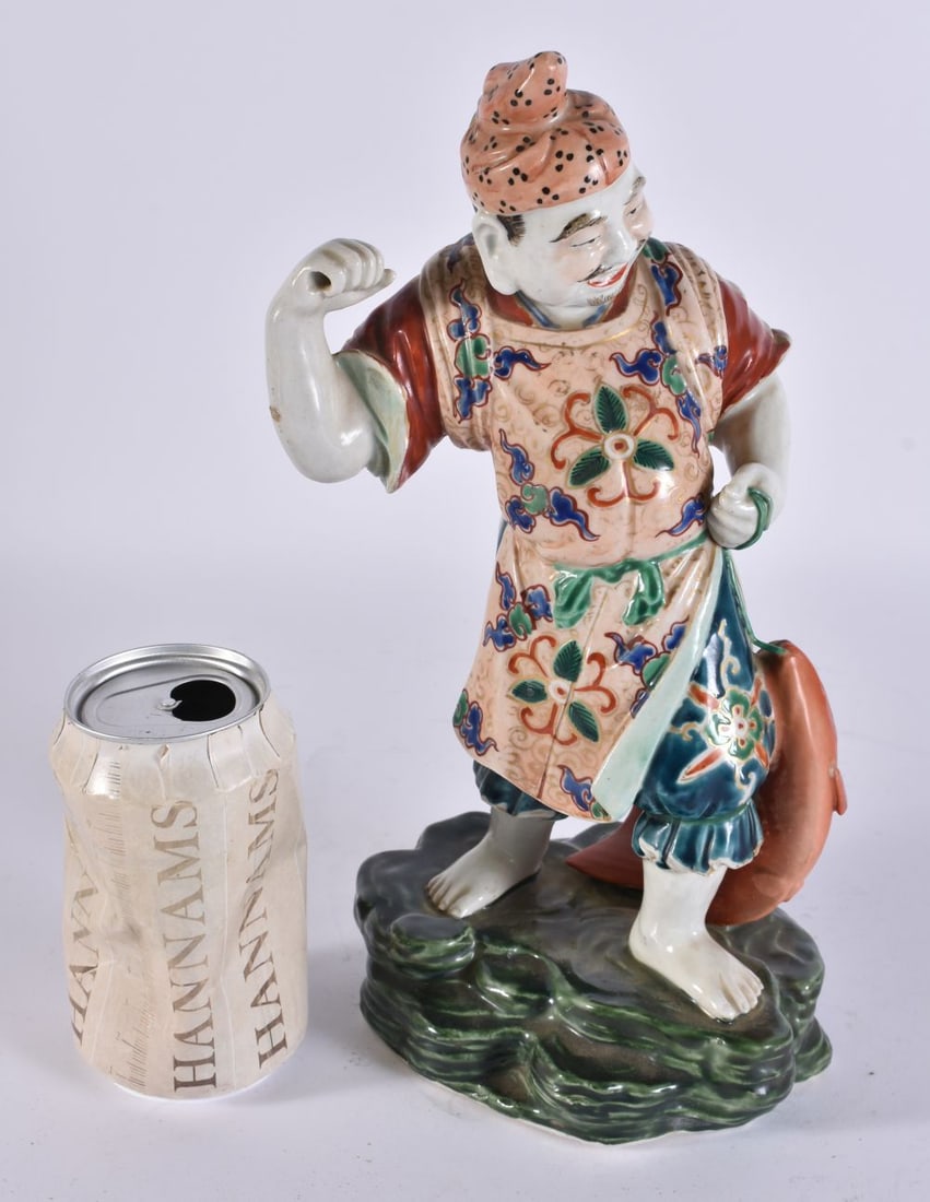 A LARGE 19TH CENTURY JAPANESE MEIJI PERIOD AO KUTANI PORCELAIN FIGURE. 28 cm high.: A LARGE 19TH CENTURY JAPANESE MEIJI PERIOD AO KUTANI PORCELAIN FIGURE. 28 cm high.