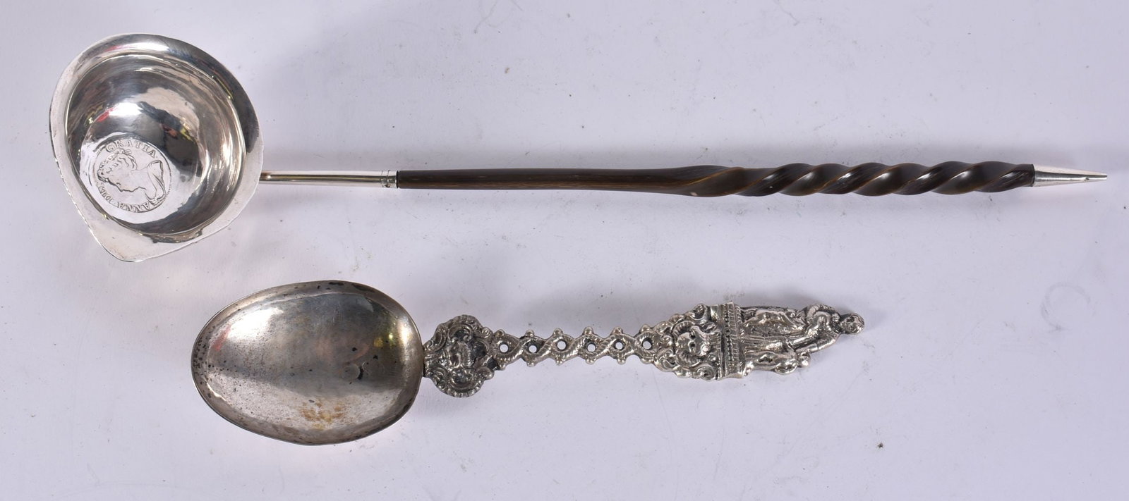 AN ANTIQUE SILVER SPOON and a silver toddle ladle. 104 grams overall. (2) (1 of 2)