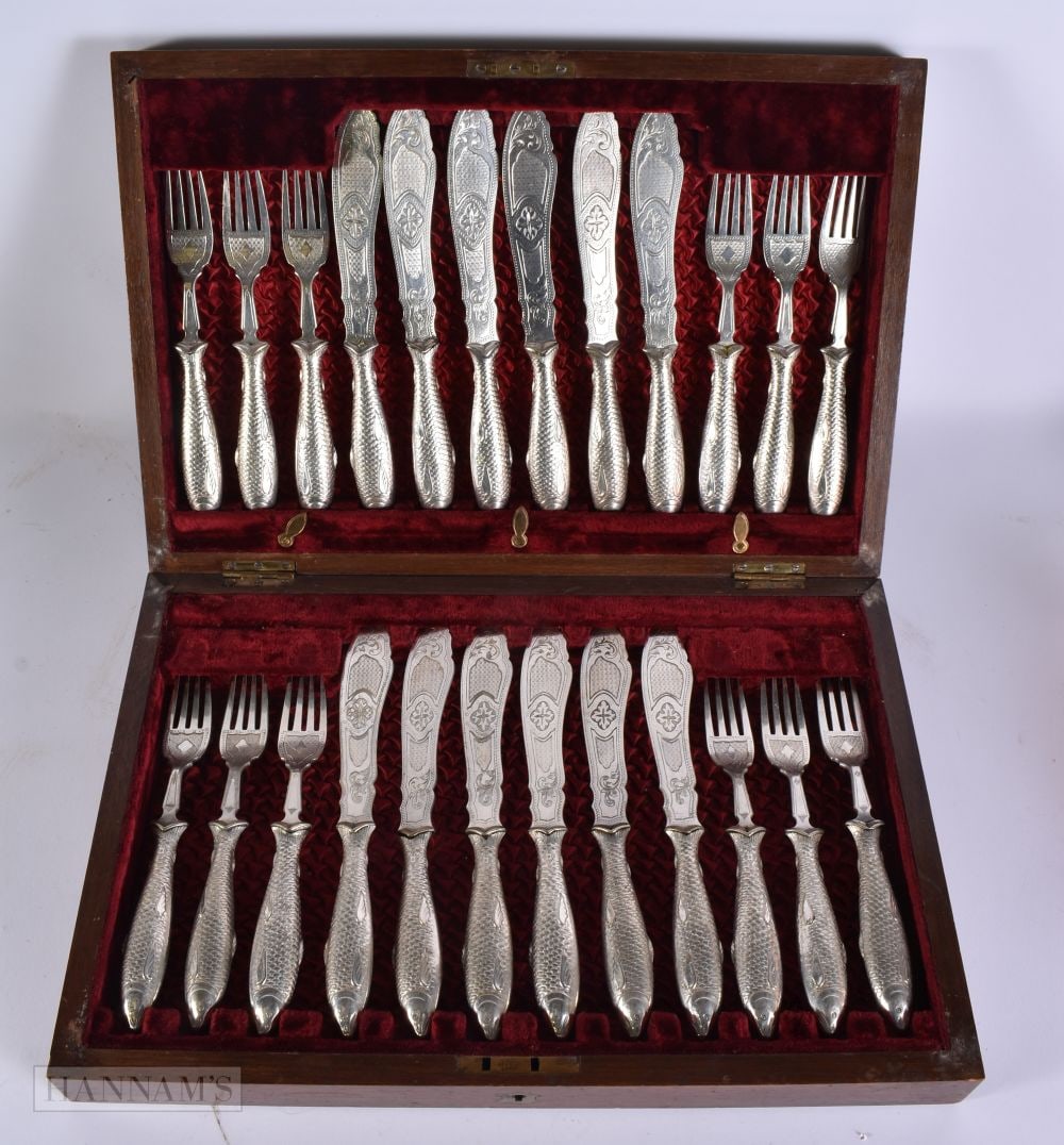 A FINE SET OF VICTORIAN SILVER PLATED FISH KNIVES AND FORKS. Box 38 cm x 26 cm. We are UNABLE to off (1 of 2)