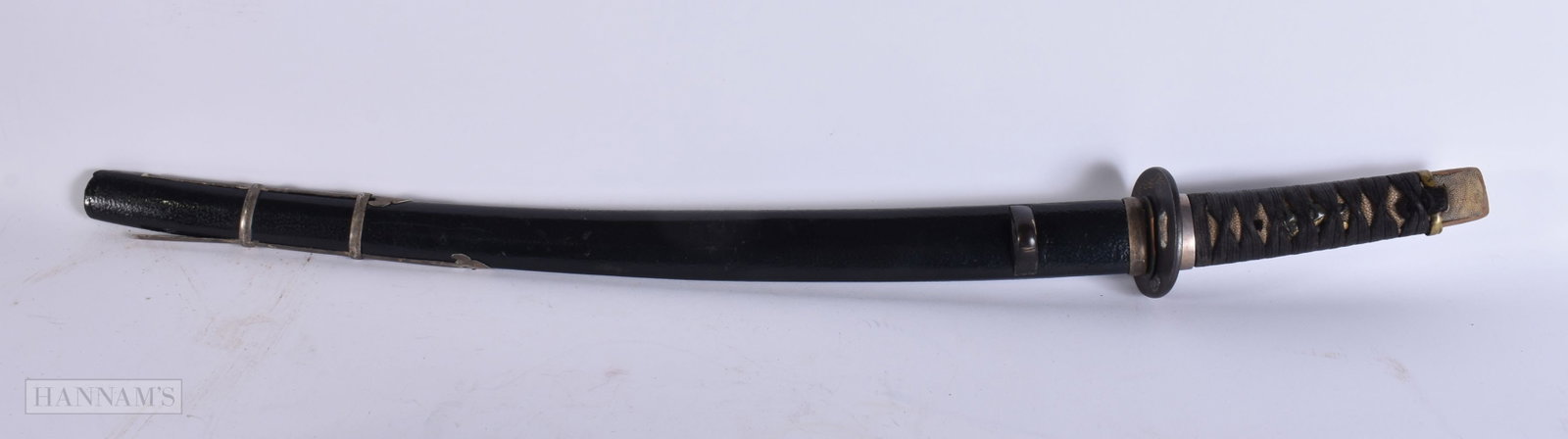 A 19TH CENTURY JAPANESE MEIJI PERIOD SWORD with unmarked tang. 68 cm long. We are UNABLE to offer in (1 of 3)