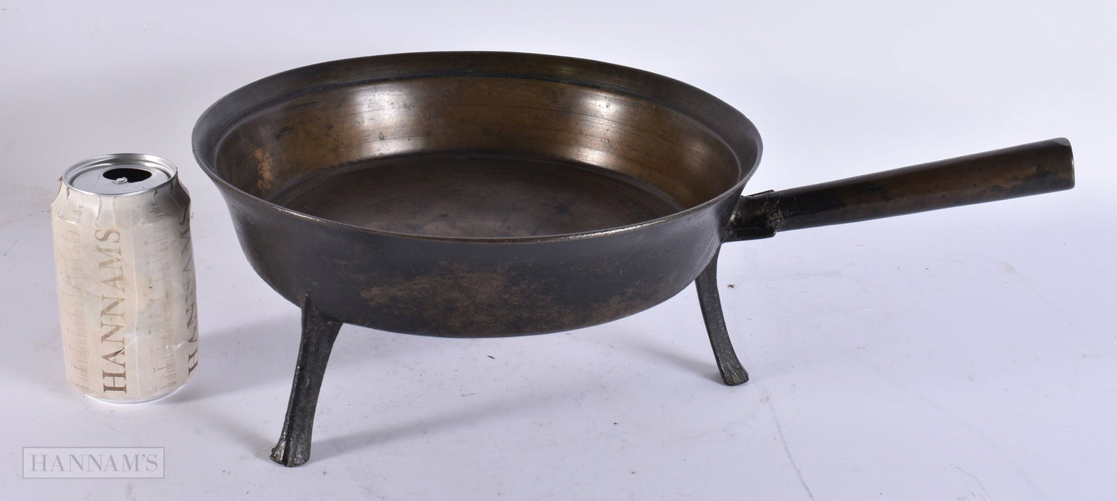 AN EARLY 18TH CENTURY CAST IRON SKILLET. 39 cm wide. (1 of 3)