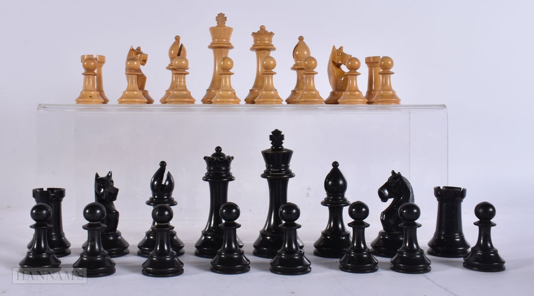 A STAUNTON PATTERN CHESS SET. Largest 8.5 cm high. (qty): A STAUNTON PATTERN CHESS SET. Largest 8.5 cm high. (qty)