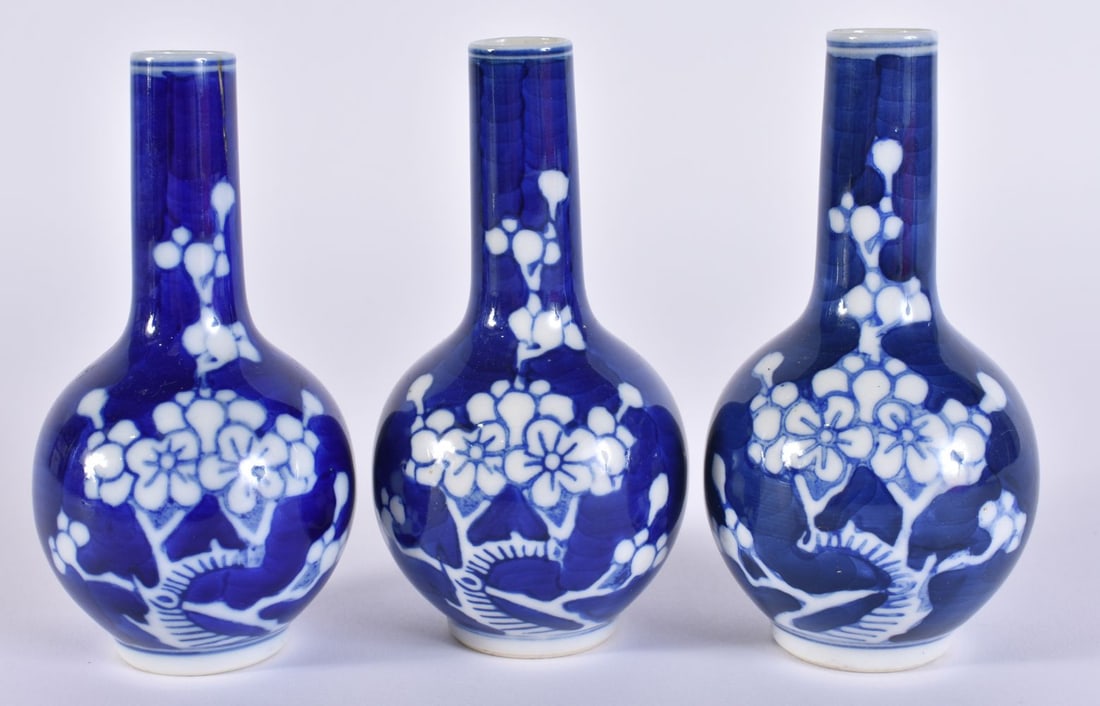 THREE CHINESE BLUE AND WHITE MINIATURE PRUNUS VASES. 10 cm high. (3) (1 of 5)