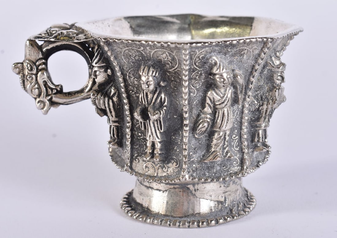 A CHINESE WHITE METAL IMMORTALS LIBATION CUP. 6.5 cm x 8.5 cm. (1 of 6)