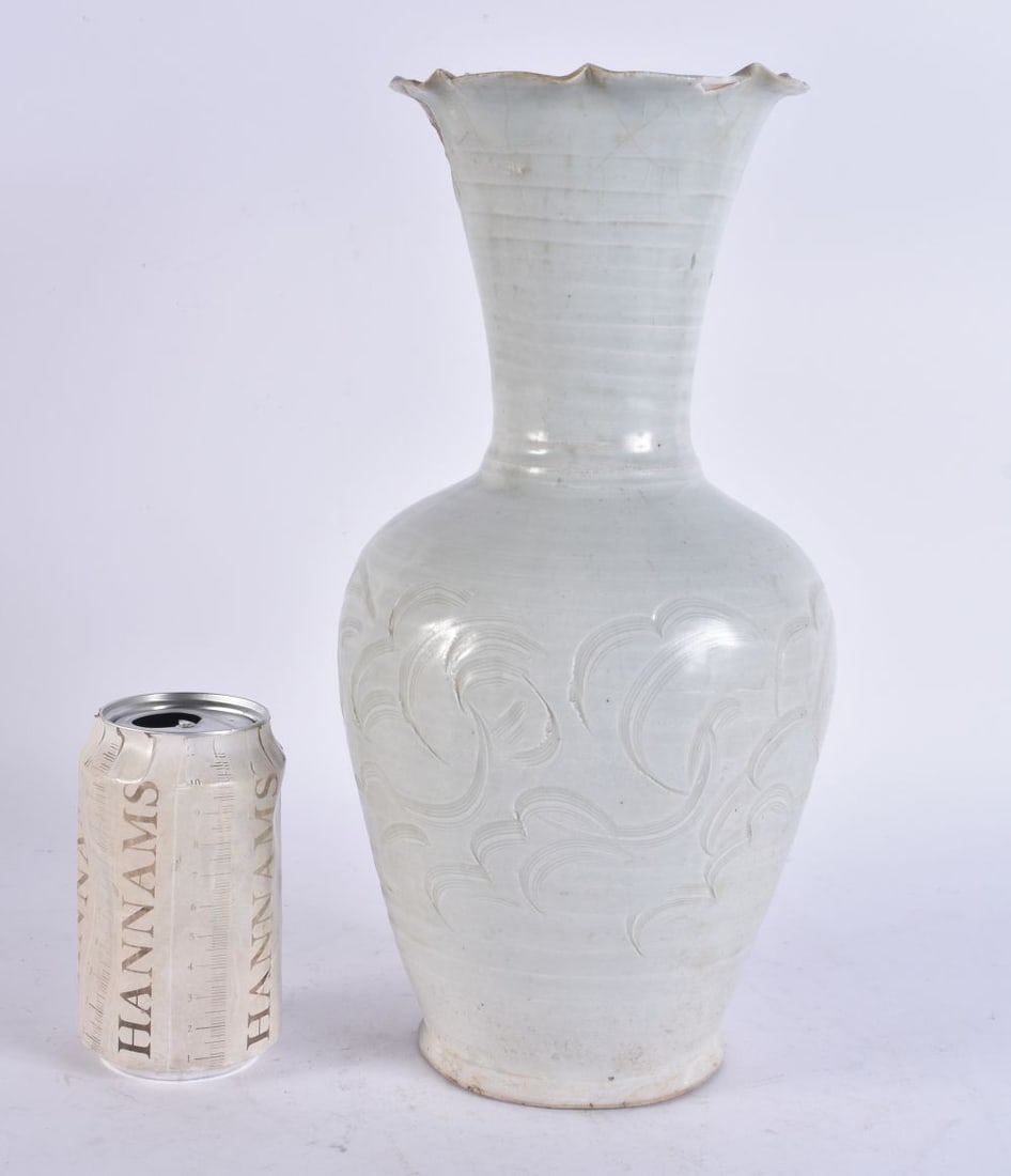 A RARE LARGE EARLY CHINESE QINGBAI VASE incised with foliage. 32 cm high.: A RARE LARGE EARLY CHINESE QINGBAI VASE incised with foliage. 32 cm high.