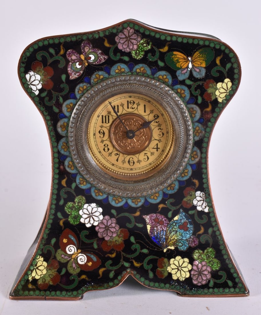 AN UNUSUAL EARLY 20TH CENTURY JAPANESE MEIJI PERIOD CLOISONNE ENAMEL CLOCK decorated with foliage. 1: AN UNUSUAL EARLY 20TH CENTURY JAPANESE MEIJI PERIOD CLOISONNE ENAMEL CLOCK decorated with foliage. 15 cm x 10 cm.