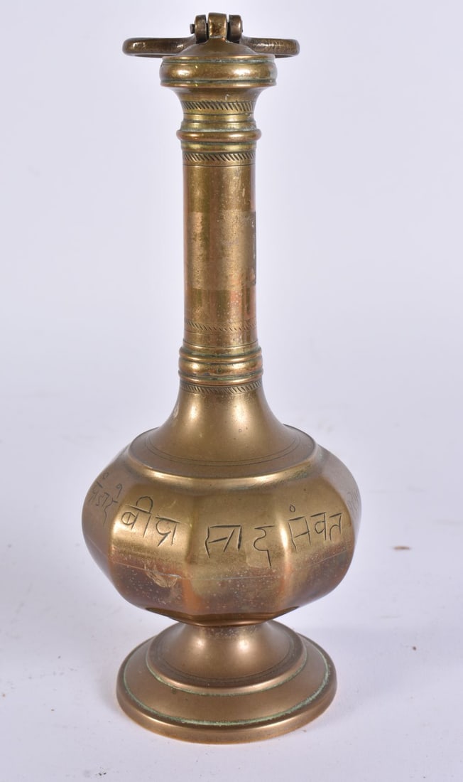 A 19TH CENTURY ISLAMIC INDIAN BRONZE VESSEL AND COVER decorated with scripture and calligraphy. 20 c (1 of 5)