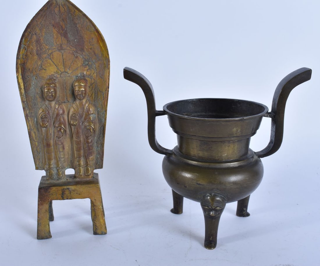 A 19TH CENTURY CHINESE TWIN HANDLED BRONZE CENSER together with a bronze Buddhistic shrine. Largest (1 of 5)