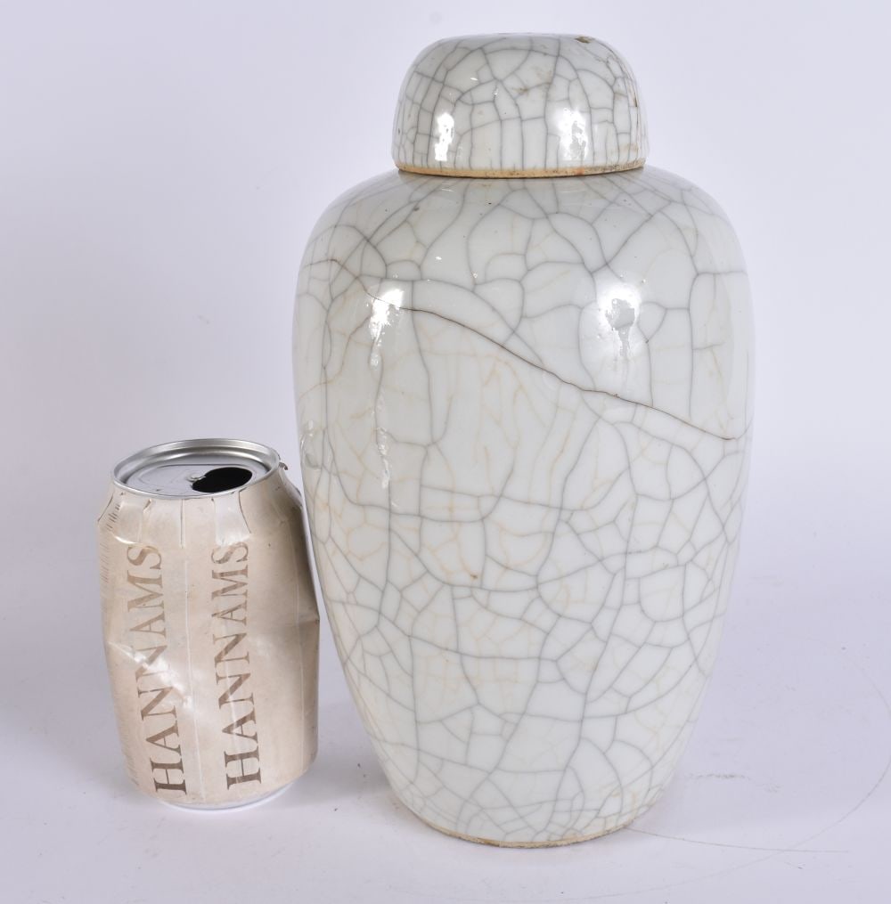 A 19TH CENTURY CHINESE GUAN TYPE POTTERY JAR AND COVER Qing. 25 cm high. (1 of 4)