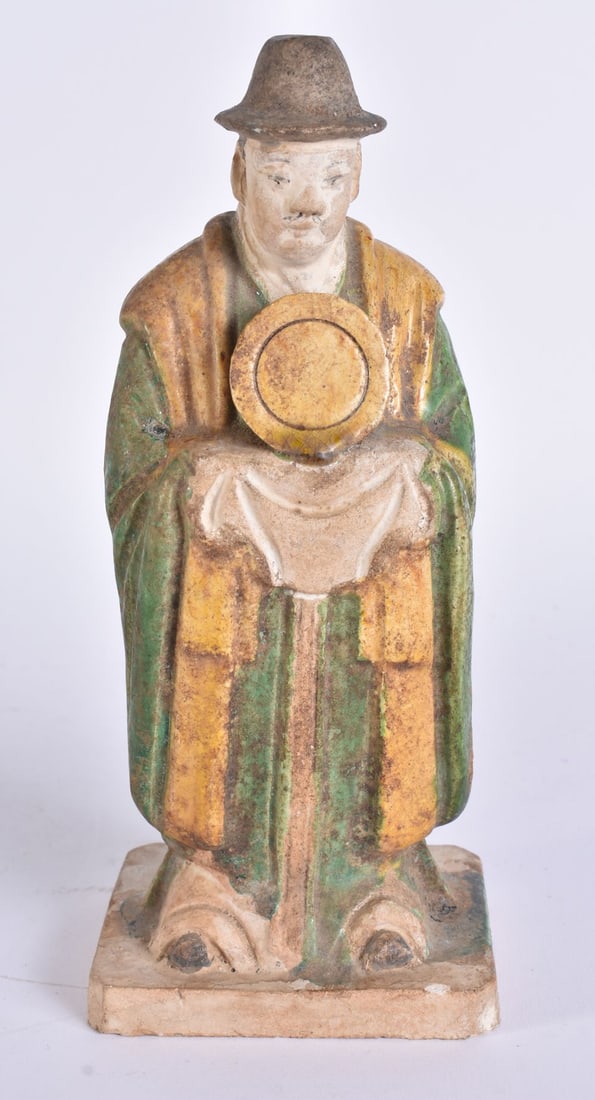 A CHINESE QING DYNASTY SANCAI GLAZED POTTERY TOMB FIGURE. 19 cm high. (1 of 6)