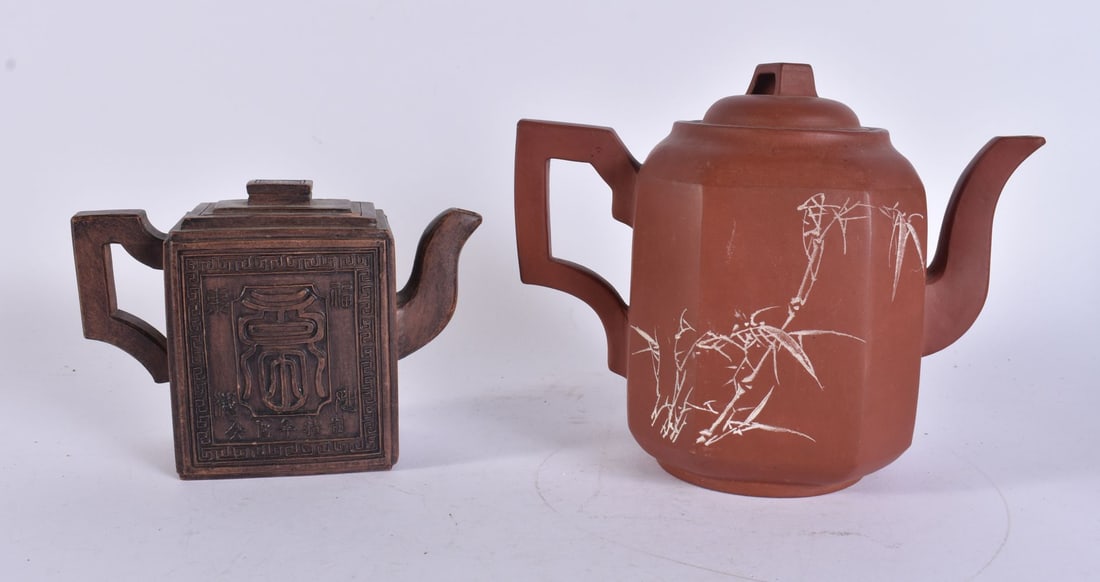TWO CHINESE YIXING POTTERY TEAPOTS AND COVERS. Largest 17 cm x 16 cm. (2) (1 of 6)