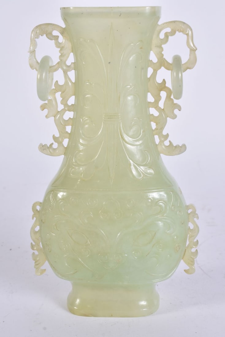 A LATE 19TH CENTURY CHINESE TWIN HANDLED JADE VASE Late Qing, carved with taotie mask heads. 16 cm h (1 of 7)