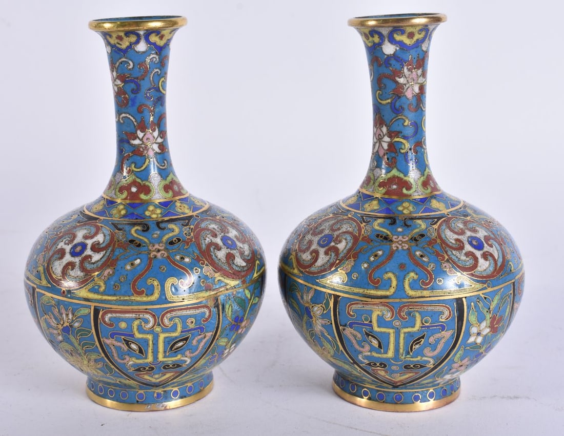 A PAIR OF 19TH CENTURY CHINESE CLOISONNE ENAMEL VASES decorated with roundels and mask heads. 12.5 c (1 of 5)