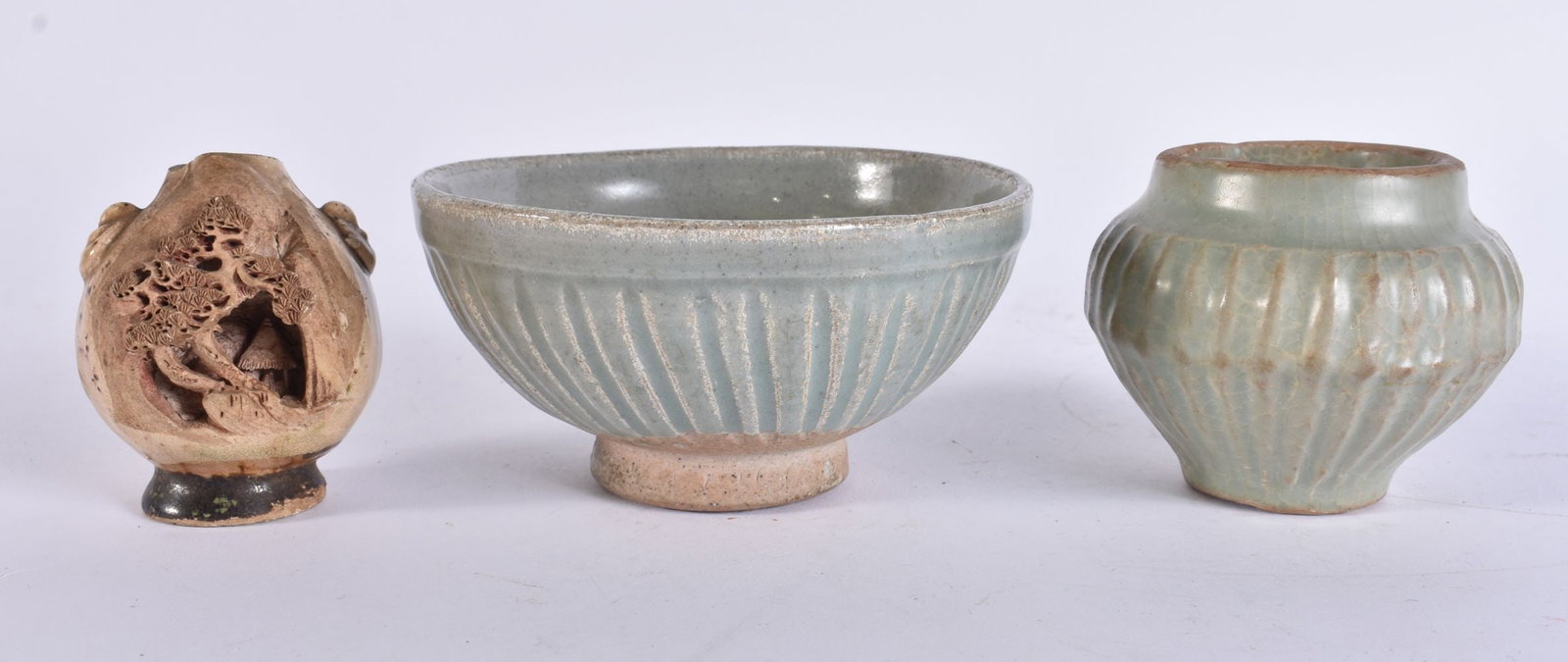 TWO 17TH/18TH CENTURY SOUTH EAST ASIAN CELADON VESSELS together with a small landscape vase. Largest (1 of 5)