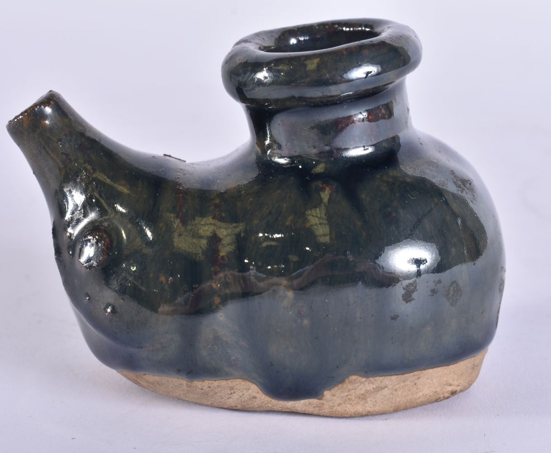 A 19TH CENTURY SOUTH EAST ASIAN POTTERY WATER DROPPER. 8.5 cm wide. (1 of 5)