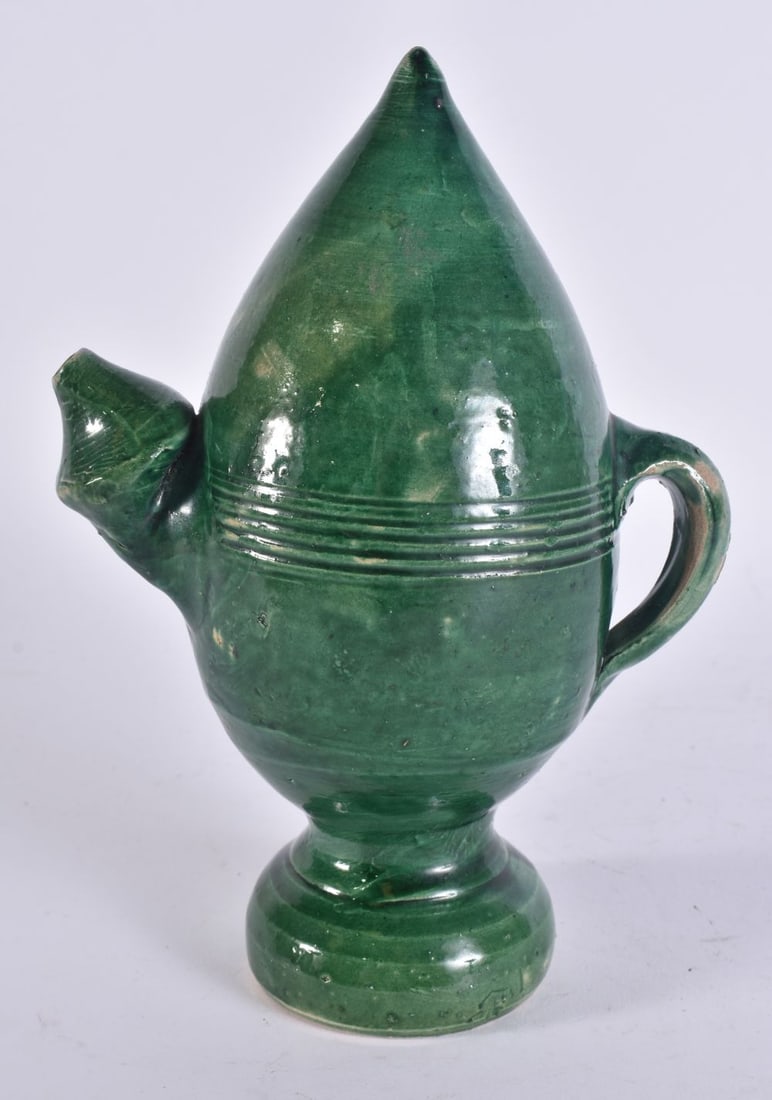 A 19TH CENTURY TURKISH KANAKKALE GREEN GLAZED POTTERY EWER. 19 cm high. (1 of 4)