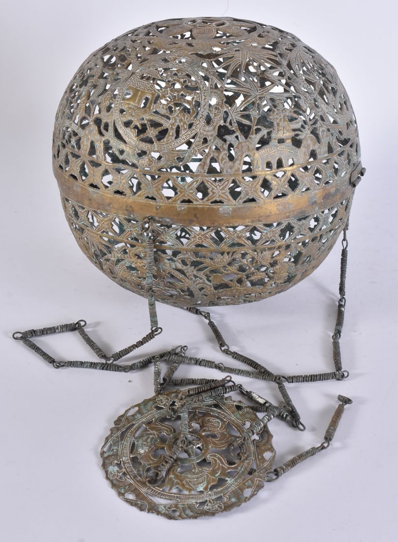 A 19TH CENTURY MIDDLE EASTERN RETICULATED BRASS HANGING LANTERN. 21 cm wide. (1 of 5)