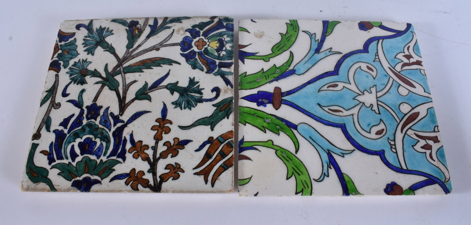 TWO MIDDLE EASTERN IZNIK FAIENCE TILES. 20 cm square. (2) (1 of 8)