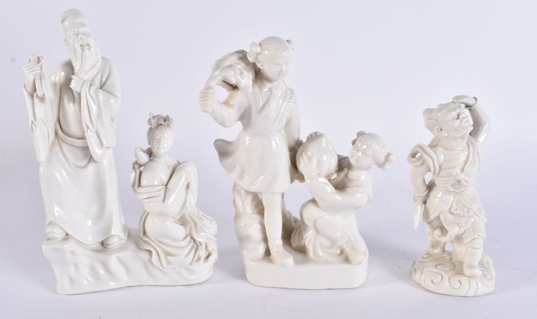 THREE CHINESE BLANC DE CHINE PORCELAIN FIGURES. Largest 19 cm high. (3) (1 of 6)
