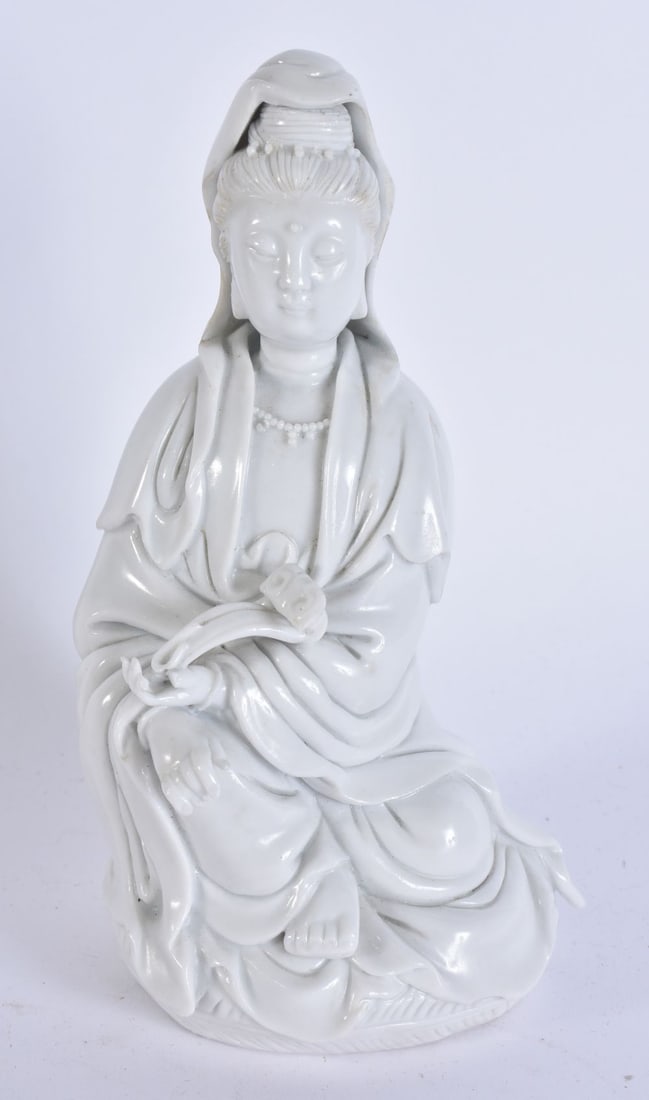 A 19TH CENTURY CHINESE BLANC DE CHINE PORCELAIN FIGURE OF AN IMMORTAL. 17 cm high.: A 19TH CENTURY CHINESE BLANC DE CHINE PORCELAIN FIGURE OF AN IMMORTAL. 17 cm high.