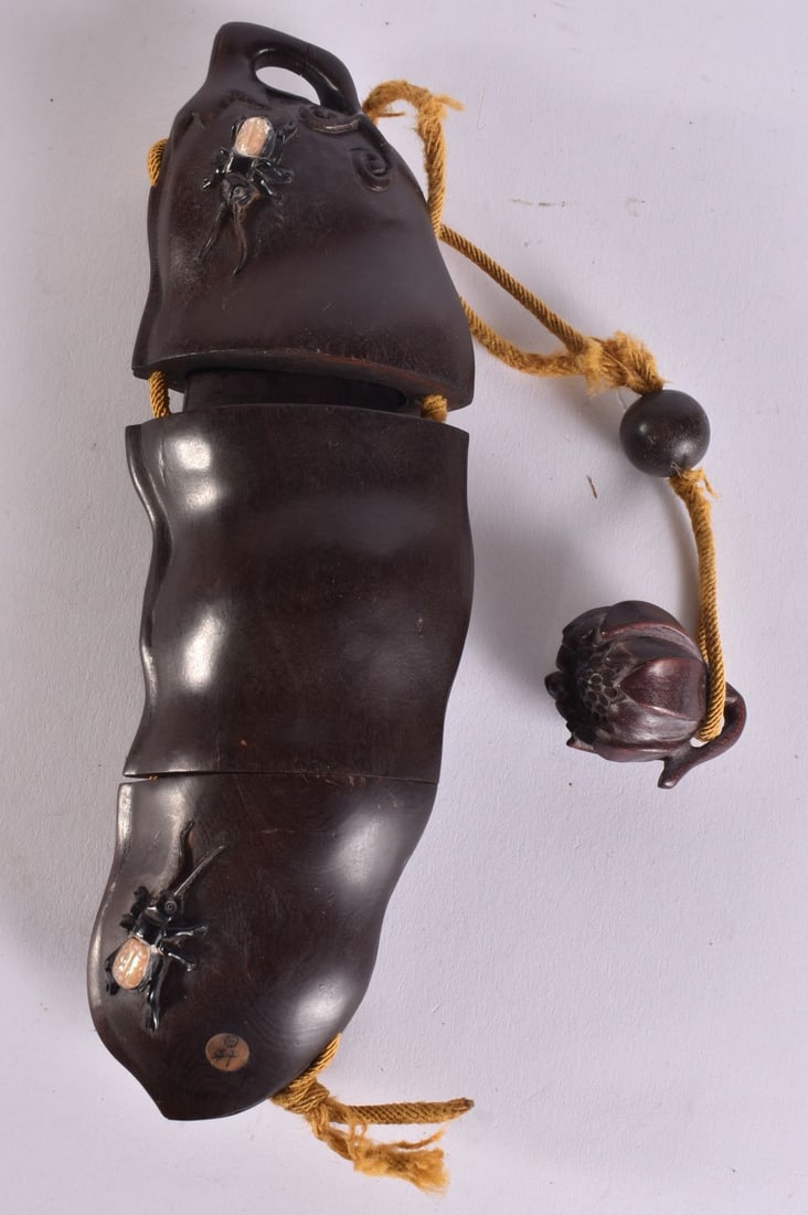 A JAPANESE WOOD INRO. 17 cm long. (1 of 4)