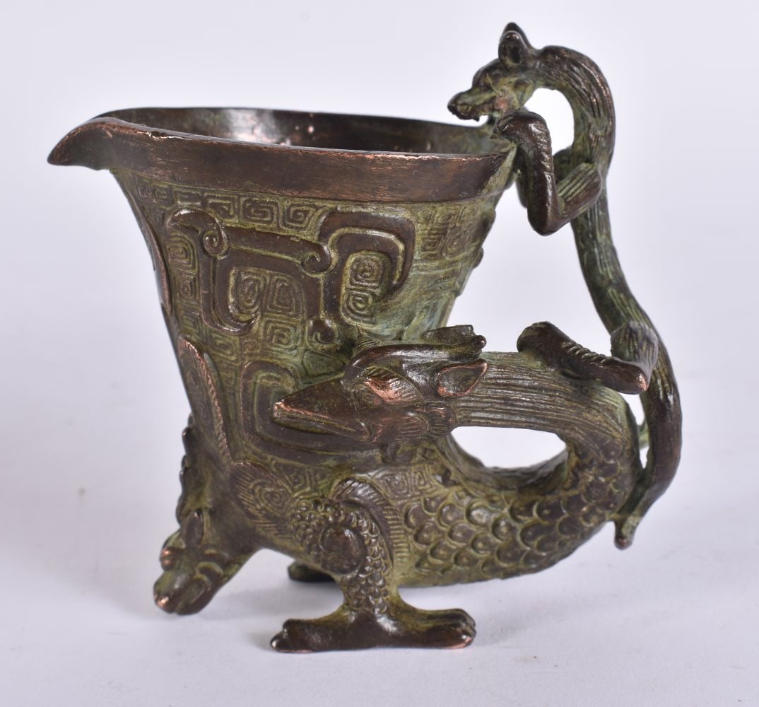 A CHINESE BRONZE JUE CUP. 8 cm x 8 cm. (1 of 5)